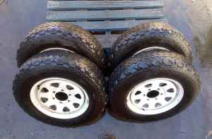 set of four 4wd or trailer wheels with tyres