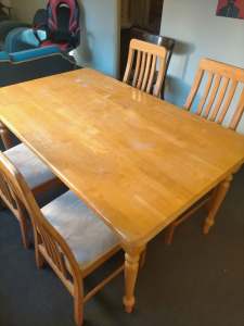 Dining table with four matching chairs