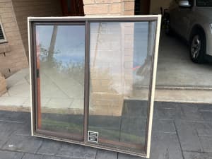 Aluminum window frame with glass