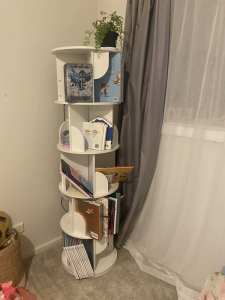 Brand new five tier rotating bookshelf