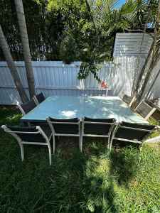 Outdoor dining table with 8 chairs