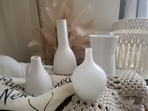white ikea vase and candle holder