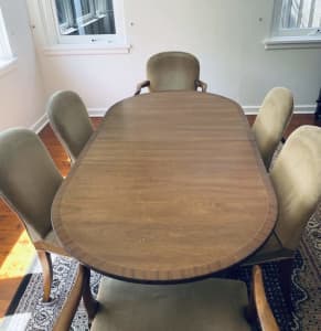 Antique polished wood dining table with 6 chairs