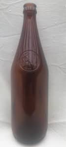 empty beer bottles, pick axe brand, many left 90 cents each, 750 ml