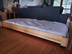Childrens trundle bed on wheels