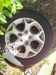 Negotiable: $50 Holden rim, reduced from $100. No lug nuts