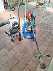 Victor lawnmower and edger and a blower and whipper snipper