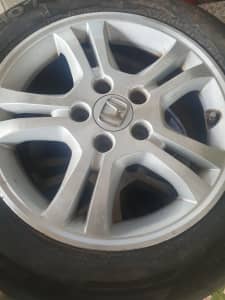 Honda 16 inch alloy rims with tyres