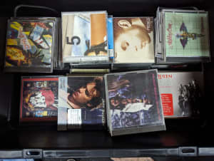 Various CDs & DVDs for sale.