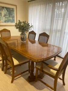 Extendable wooden inlay dining table setting with 6 chairs