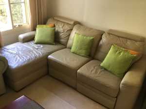 FREE 3-seater leather lounge with cushions