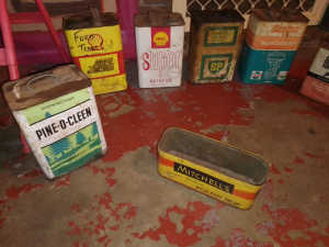 Old tins and spark plug cabinet