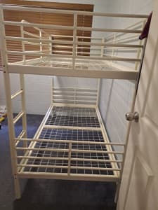 Single bunk beds with mattresses