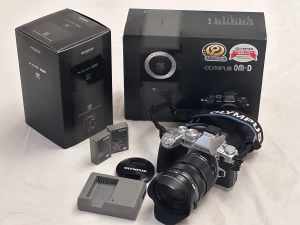 Olympus OMD EM1 camera with 12-40mm f2.8 lens perfect in box