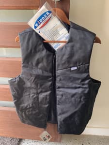 Motorcycle gear, never used HEATED VEST AND JENNY REB BOOTS 
