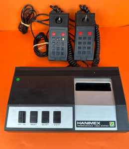 Hanimex advanced programmable video system 1392 console and games
