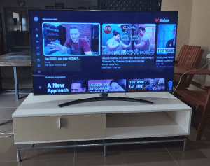 LG Smart T.V. 55 inch and white tv stand