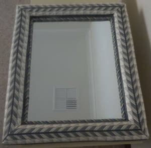 Padded Wall mirror with fabric padding. Actual mirror 38 cm x 48 cm