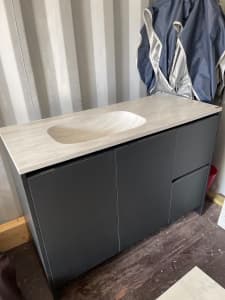 Black traceless board vanity with corian built in bench top