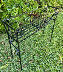 Retro 50s style black painted metal planter plant stand.