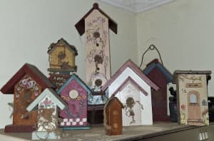 Collection of 9 decorative, mostly handmade and handpainted birdhouses