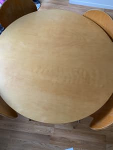 Round wooden table with 4 chairs