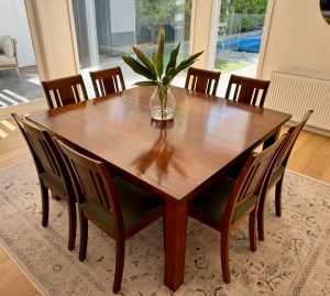 Nicholas Dattner dining table and matching chairs (x8)