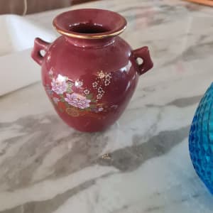 Small pretty brown vase