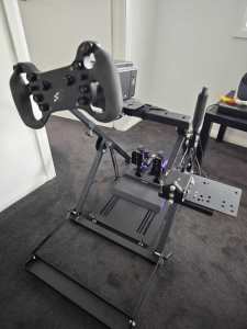 Sim racing set (Simagic wheel and Conspit hydraulic pedals)