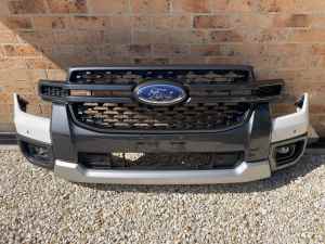 As new genuine Ford Ranger-next Gen Bumper and grill with fog lights.