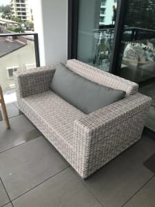 Double seat outdoor lounge without seating cushion