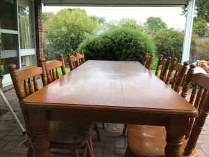 Solid pine dining table and 8 chairs