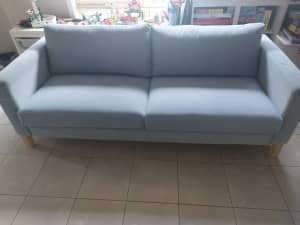Modern light grey Ikea couch