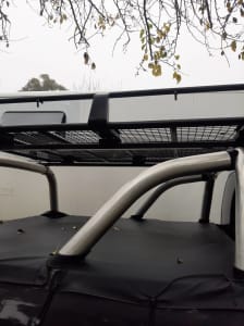 Roof rack luggage carrier and awning