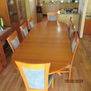 Chiswell Double Extendable Dinning Table and 8 Chairs.