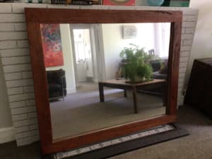 Large, heavy, wooden framed mirror