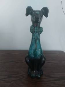 Vintage Blue Mountain Pottery long neck dog with bow tie.