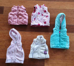 Size 0 baby girls vests