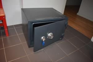 Safe with combination lock and key