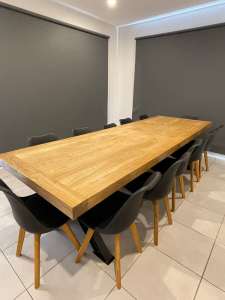 Beautiful modern industrial 12 Seater solid wood table with 12 black c