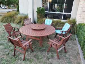 Jensen Jarrah large outdoor table set has 6 chairs