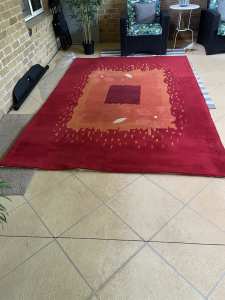 Red and orange rug - large living room size