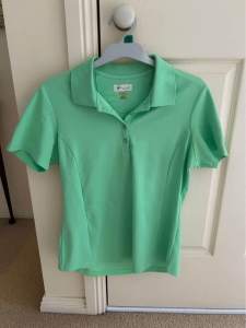 Womens Golf/Tennis Greg Norman shirt Size 10-12 (M)