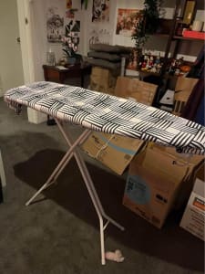 Ironing board with brand new cover