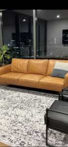 Tan leather 3 seater lounge $1500