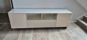 TV unit with glass top and drawer, solid in good condition, cream