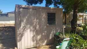 Garden tool shed with PA door and louvre window