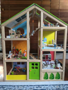 Hape All Seasons wooden dollhouse fully furnished plus family of dolls