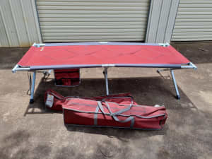 TWO OZTRAIL aluminium stretchers jumbo padded. Sell as a pair.