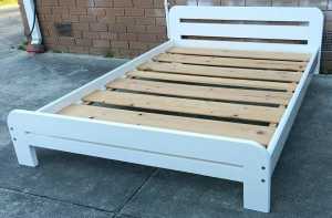 low double bed with mattress, solid timber